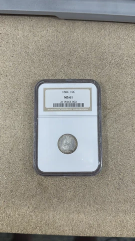 1884 Seated Liberty Dime NGC MS 61. Toned edge Cover