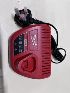 Original Milwaukee C12C M12 12V Akku Ladegerät Neu - Bild 1 von 2