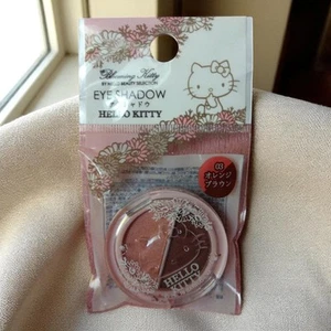 Sombra de ojos Sanrio Hello Kitty 03 naranja marrón maquillaje cosmético - Imagen 1 de 2
