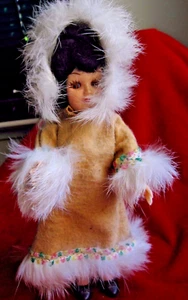 VINTAGE HARD PLASTIC ESKIMO DOLL WITH MATERIAL FUR TIMMED COAT - Picture 1 of 11