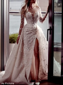 Glamorous wedding dress looks spectacular but did not fit and can’t return it. - Picture 1 of 2