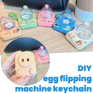 Llavero de aleta de huevo simula freír huevos revuelto juguete para aliviar el estrés D2P3 - Imagen 1 de 18