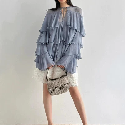 Para mujeres Verano Nueva Camisa Top de Seda Temperamento Suelta Protector Solar Informal Moda Foto 1 de 4