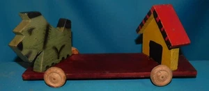 ALTES SCHIESSSPIELZEUG. HUND UND NISCHE AUS POLYCHROMEM HOLZ. L 32cm H 15cm . 1920 - Bild 1 von 10