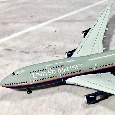Самолет 1:400 Dragon Wings United Airlines B 747-400 N176UA 55078 - запечатанная коробка - Изображение 1 из 4