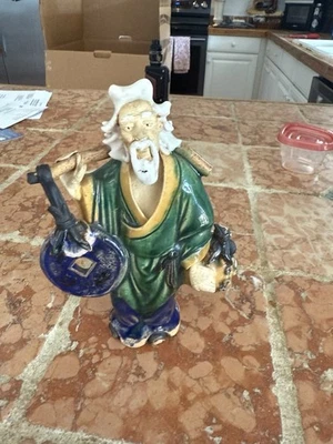 Antique Chinese Pottery Mudman Figurine Statue with Coin and Purse Marked CHINA - Image 1 of 3