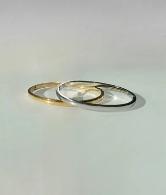 Pack de 2 brazaletes sin deslustre liso de acero inoxidable (1 plata + 1 oro) talla 7 Foto 1 de 4