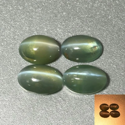 1,88 quilates [lote de 4 piezas] raro ovalado 5,8 x 4,2 mm verde a rojo alejandrita ojo de gato Foto 1 de 4