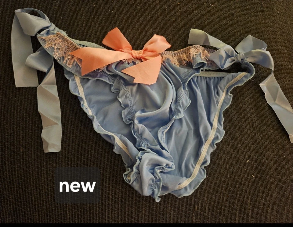 Nuevas bragas azules satinadas con lazo rosa y encaje extra grandes Foto 1 de 1