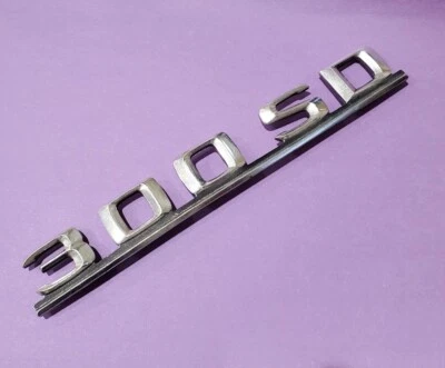 Bin22 Used Metal ✅ 1981-85 Mercedes W126 300SD  Rear Trunk Chrome Emblem OEM - Image 1 of 4