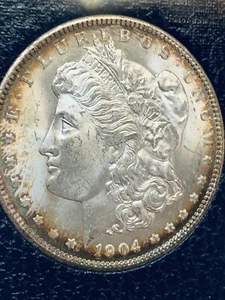 Dólar de plata O Morgan 1904 UNC Paramount Intl tonificado - Imagen 1 de 9