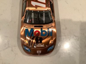 RYAN NEWMAN AUTOGRAPHED 2006 DODGE CHARGER MOBIL 1 COPPER FINISH DIECAST & CARD - Picture 1 of 14