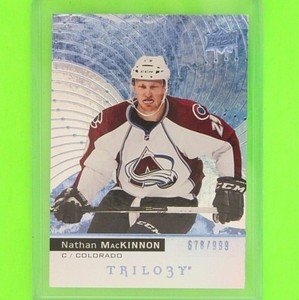 NATHAN MacKINNON  2017-18  " TRILOGY BLUE 678/999 "  #22  Colorado Avalanche