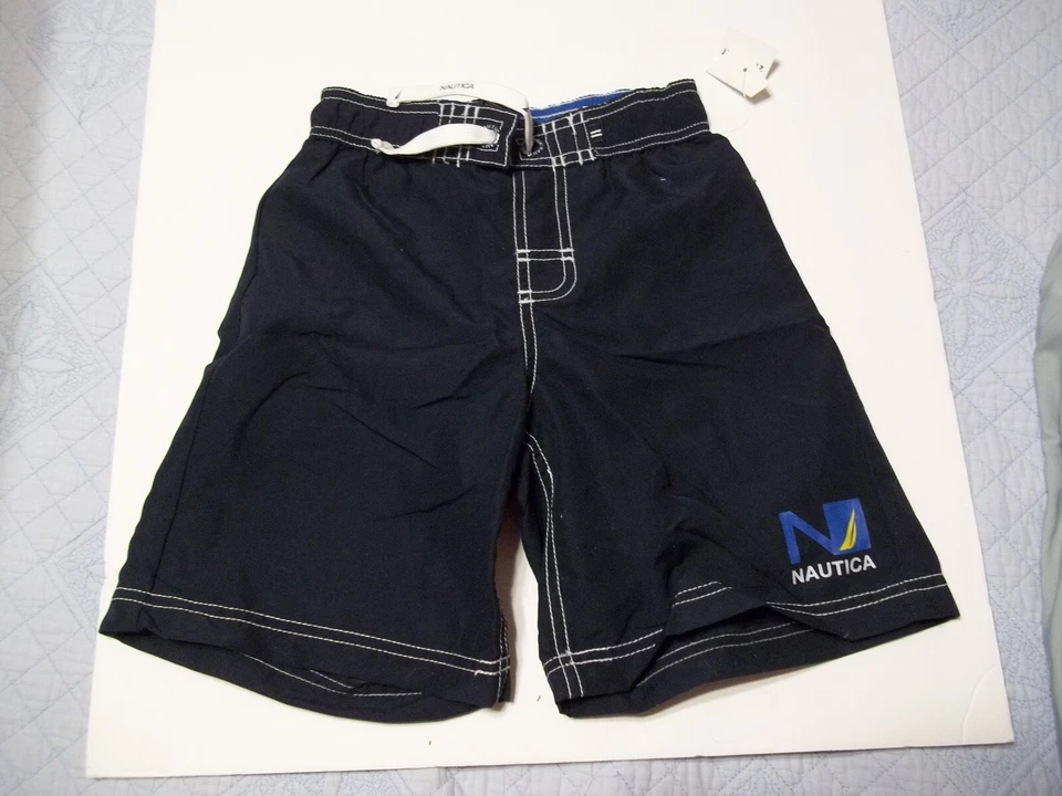 NUEVO Traje de baño Nautica Boys tabla corta baúl nuevo con etiquetas talla 7 sólido azul marino Foto 1 de 2