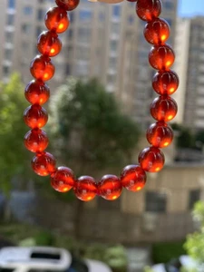 Pulsera de cuentas redondas de cristal granate rojo naranja natural de 8,9 mm AAA - Imagen 1 de 9