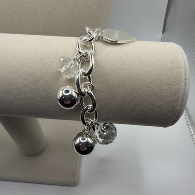 Pulsera Chicos Tono Plata Bola y Cristal Vidrio con Dije Corazón Foto 1 de 4