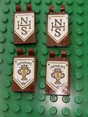 LEGO Tile 2x3 With 2 Clips in Reddish Brown Stickers Pattern x 4 / Set 70425 - Image 1 of 4