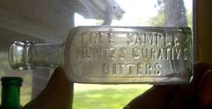 FREE SAMPLE HENTZ'S CURATIVE BITTERS 4 1/4"TALL HAND BLOWN 1890s DUG BOTTLE - Picture 1 of 5