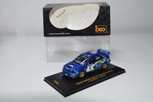 B25 1:43 IXO RAM096 SUBARU IMPREZA WRC #11 WINNER GB RALLY 2002 SOLBERG MIB - Picture 1 of 19
