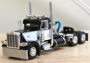 DCP black/white Peterbilt 389 daycab tractor  1/64 new no box