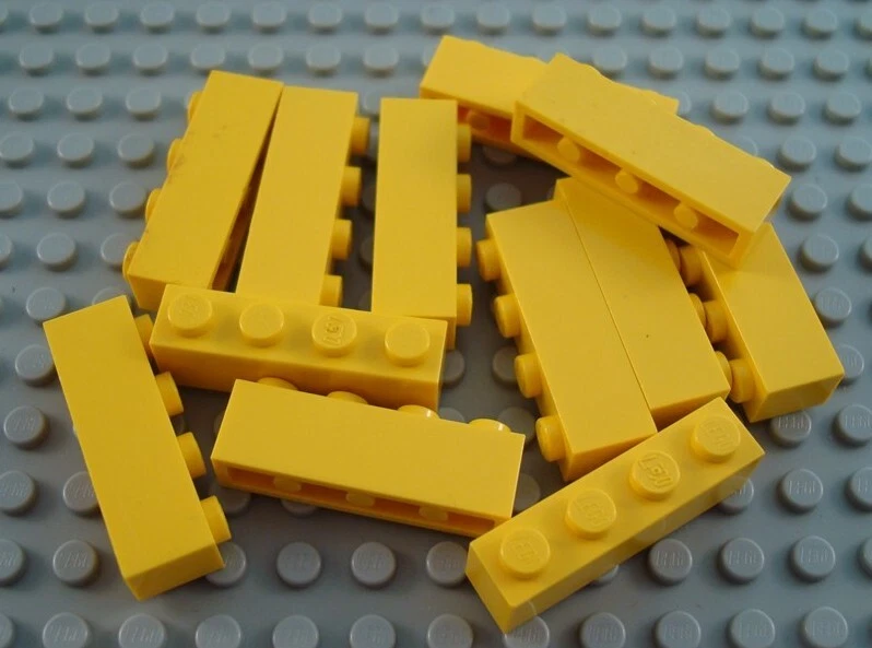 LEGO Lot of 12 Yellow 1x4 Basic Building Brick Pieces - Image 1 of 1