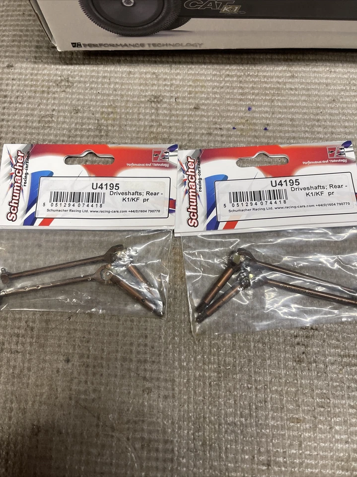 Eixos de transmissão traseiros Schumacher U4195 K1/KF pr  - Imagem 1 de 1