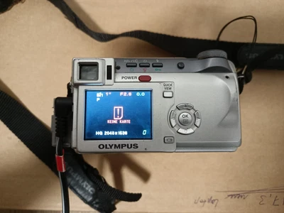 Fitbit Inspire 2 Aktivitäts-Tracker & Kamera Olympus C760 Ultra Zoom - Bild 1 von 4