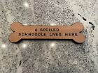A spoiled Schnoodle lives here sign 11.5in long Wall dec for dog lovers.