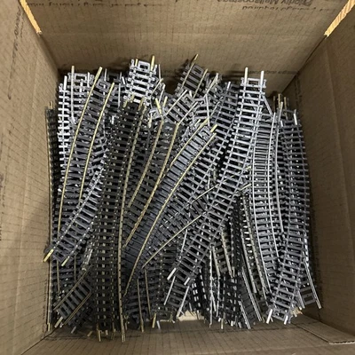 HO Scale Lot of (100) Curve Track Good Condition different manufacturers - Image 1 of 2