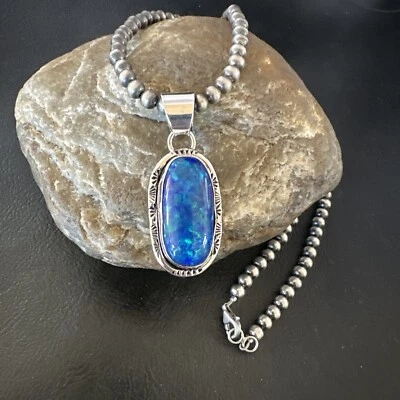 Colgante navajo de plata de ley 16482 de ópalo de fuego azul para hombre y mujer Foto 1 de 4