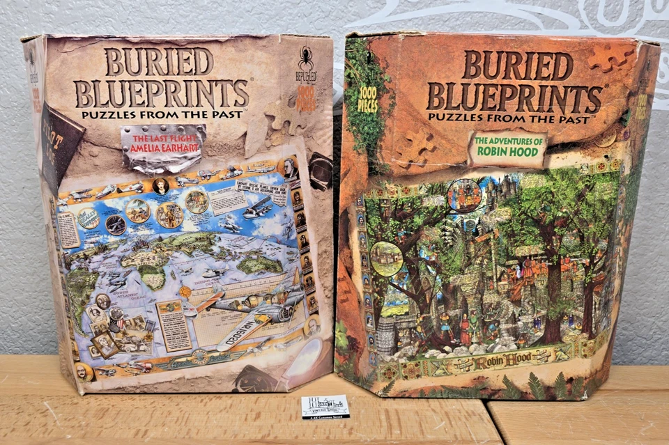 Lot of 2 Bepuzzled Buried Blueprints Puzzles: Robinhood & Flight Amelia Earhart - Image 1 of 4