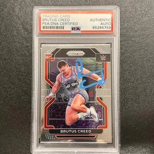 2022 Panini Prizm NXT 2.0 #144 Brutus Creed Signed Card PSA/DNA Slabbed AUTO WWE - Picture 1 of 2