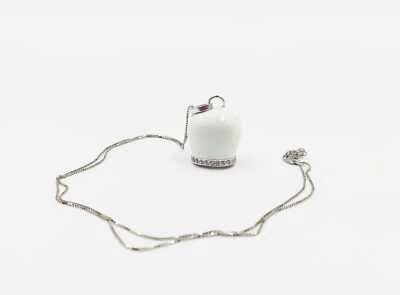 COLLANA CAMPANELLA SMALTATA BIANCO CON BORDO ZIRCONATO IN ARGENTO 925 RODIATO - Immagine 1 di 3