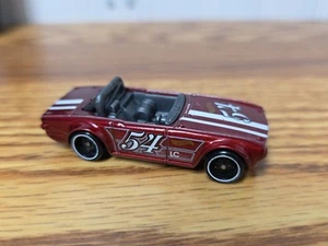 2009 HOT WHEELS TRIUMPH TR6 CONVERTIBLE #54 RED 1:64 DIECAST 2 5/8" CAR W/ WHITE - Picture 1 of 7