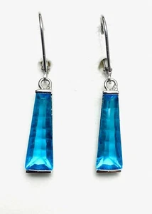 E50406L Swiss Blue Helenite Long Trillion (4x6x18mm) Silver Dangle Earrings - Picture 1 of 9