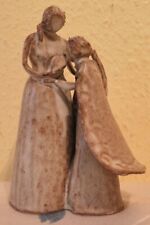 Pottery no face figurine Mother Daughter and Baby measurements are 18cm height x