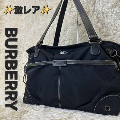 Raro Bolso de Mano Burberry Etiqueta Azul Cuero Nailon Negro 23,5 cm Longitud Foto 1 de 4