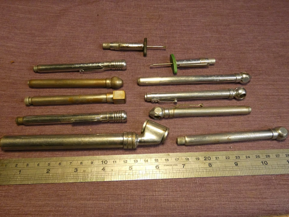 VINTAGE AUTOMOBILIA COLLECTION OF  11 TYRE GUAGES CAR  TOOLKIT PCL DUNLOP ETC - Image 1 of 4