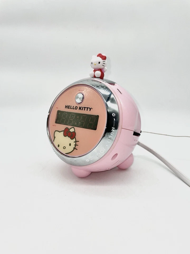 Reloj despertador vintage Hello Kitty rosa radio AM FM proyección pantalla de tiempo LED Foto 1 de 4