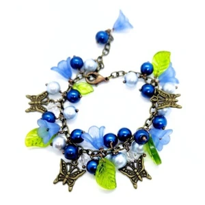 Handmade Charm Bracelet Blue Floral Beads, Green Leaves & Bronze Butterfly Charm - Picture 1 of 3