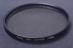 ✅ VIVITAR VMC UV-HAZE 77MM FILTER GENUINE LENS OR CAMERA SCREW IN 16-4 - Picture 1 of 2