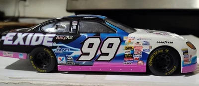 Ford Taurus 2000 1/24 #99 Jeff Burton Racing Champs. Certificado de autenticidad Exide "Pintura de guerra" Foto 1 de 4