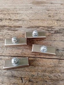 Lot Of 4 NOS Vintage Smooth Block Bike Pads- Goldish Bronze Color Metal Clad - Picture 1 of 3