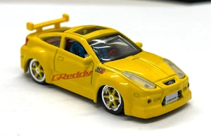 Coche sintonizador Motorworks escala 1:64, Toyota Celica GT, amarillo - Imagen 1 de 9