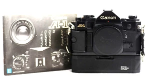 CANON A-1 SLR FILM CAMERA BODY WITH POWER WINDER AND INSTRUCTIONS (EXCELLENT) - Picture 1 of 8