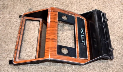 1980-1986 ford f150 f250 bronco XLT DASH RADIO BEZEL TRIM SURROUND WOODGRAIN OWM - Image 1 of 4