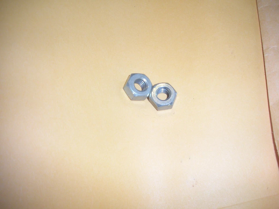 Tuerca de barra para motosierra Homelite 2 piezas 81018-1 HOMELITE OEM S 17 Foto 1 de 1