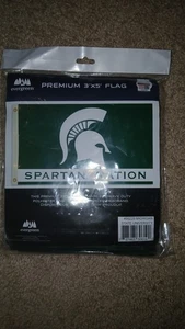 NCAA-UNIVERSIDAD ESTATAL DE MICHIGAN - BANDERA-NUEVA- 3' X 5'-NACIÓN ESPARTAN - Imagen 1 de 3