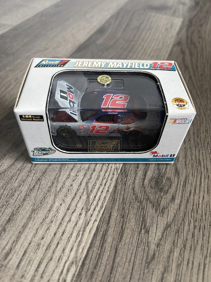 REVELL COLLECTION Jeremy Mayfield 1/64 Scale #12 Mobil 1 / KD 1999 Ford Taurus - Image 1 of 1