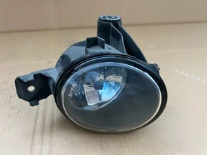 Faro antiniebla delantero derecho BMW 1 X1 X3 X5 E81 E87 E88 E82 E84 E83 E70 OEM 63176924656 - Imagen 1 de 10